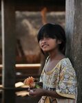 Cambodia, girl grateful for small gift JuzaPhoto